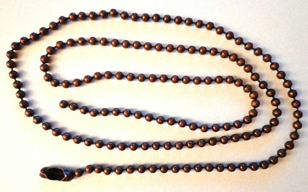 Koperen bolletjesketting