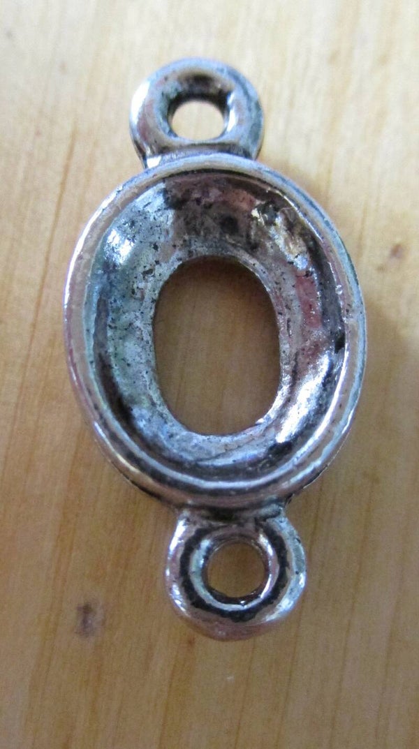 Tussenzetsel ovaal 16 x 9 mm kl90817