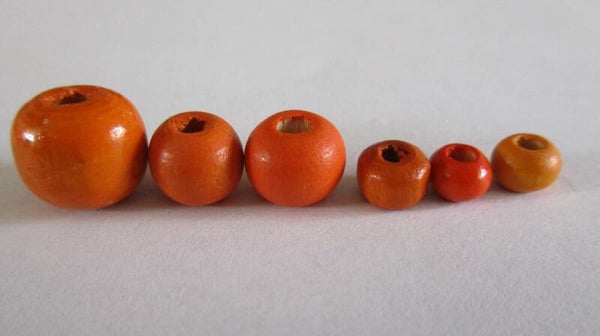 Diverse formaten houten oranje kralen kr90157 Aa