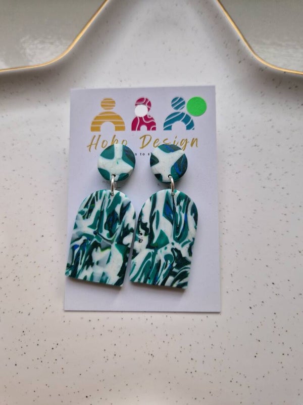 Oorbellen in petrol dessin.