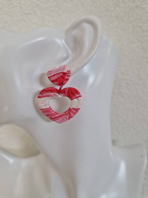 Oorbellen in rood wit dessin.