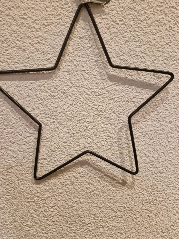 Zwarte metalen ster.