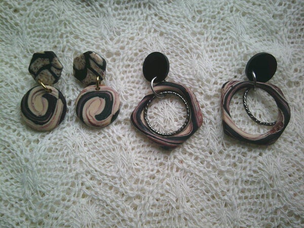 Oorhangers in zwart creme dessin 2 modellen.