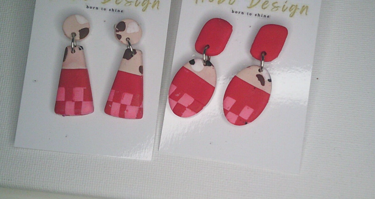 Oor bellen in roze rood met tijgerprint, twee modellen