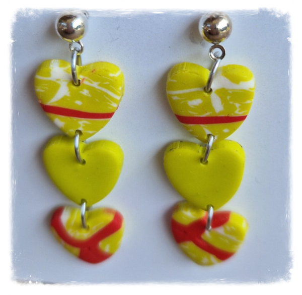 Geel dessin harten oorbel hangers,