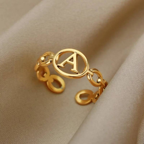 Open letter ring