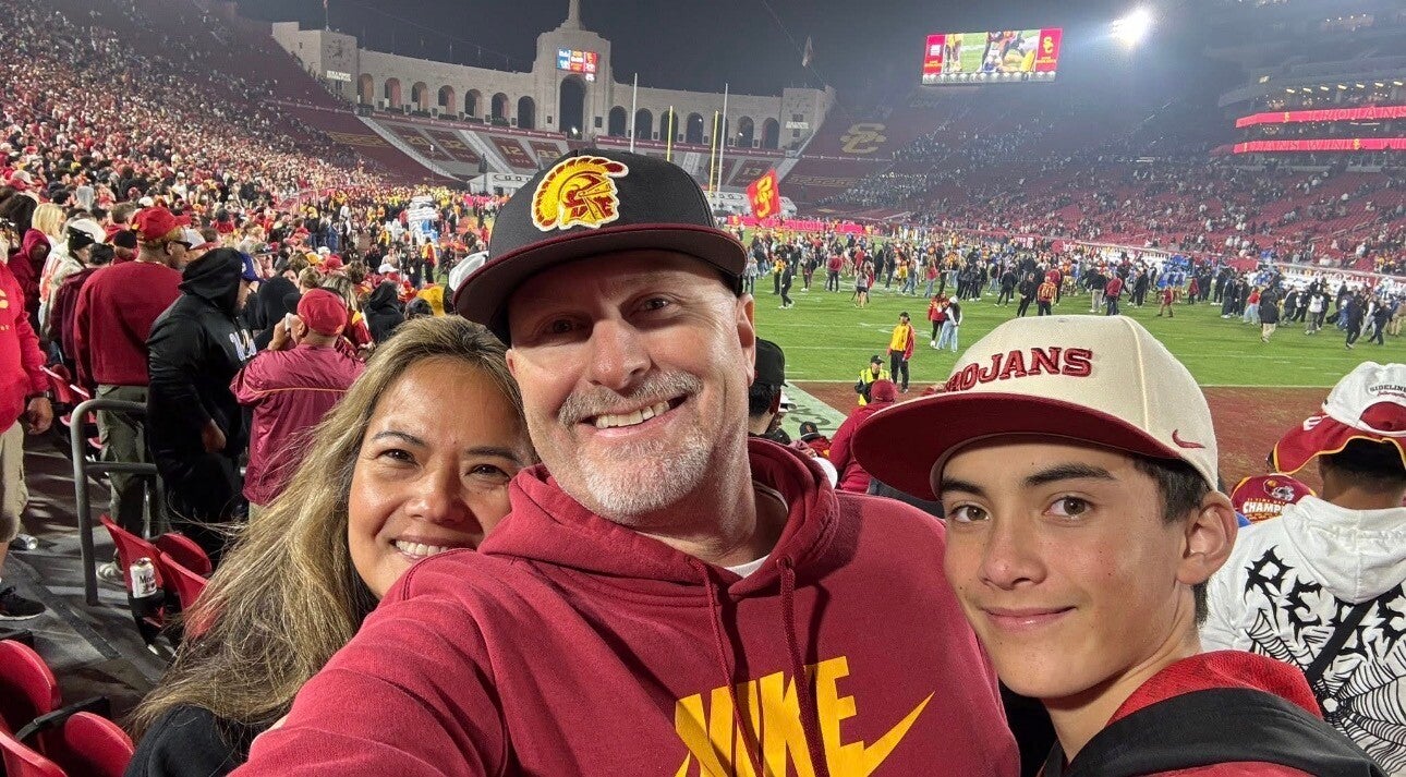 Selfie of my uncle, aunt and cousin at a USC football game. 