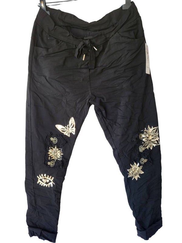 Stretchhose schwarz mit Schmetterlingen goldig, Gr. 38 - 42, 1x verfügbar