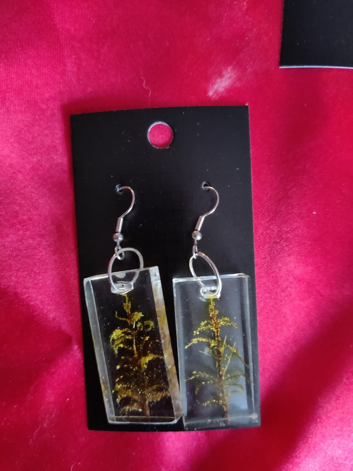 Sidottu sammal korvakorut