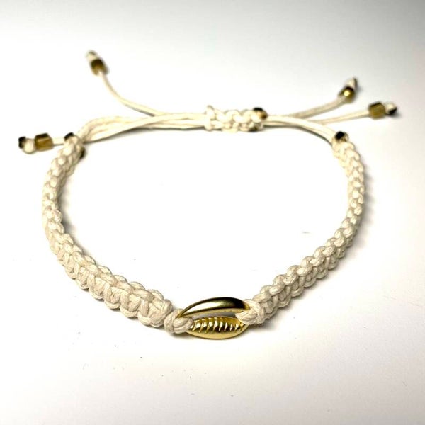 Damesarmbandje crème met schelp in goudkleur