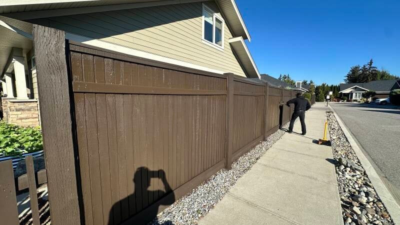 Fence staining in progress