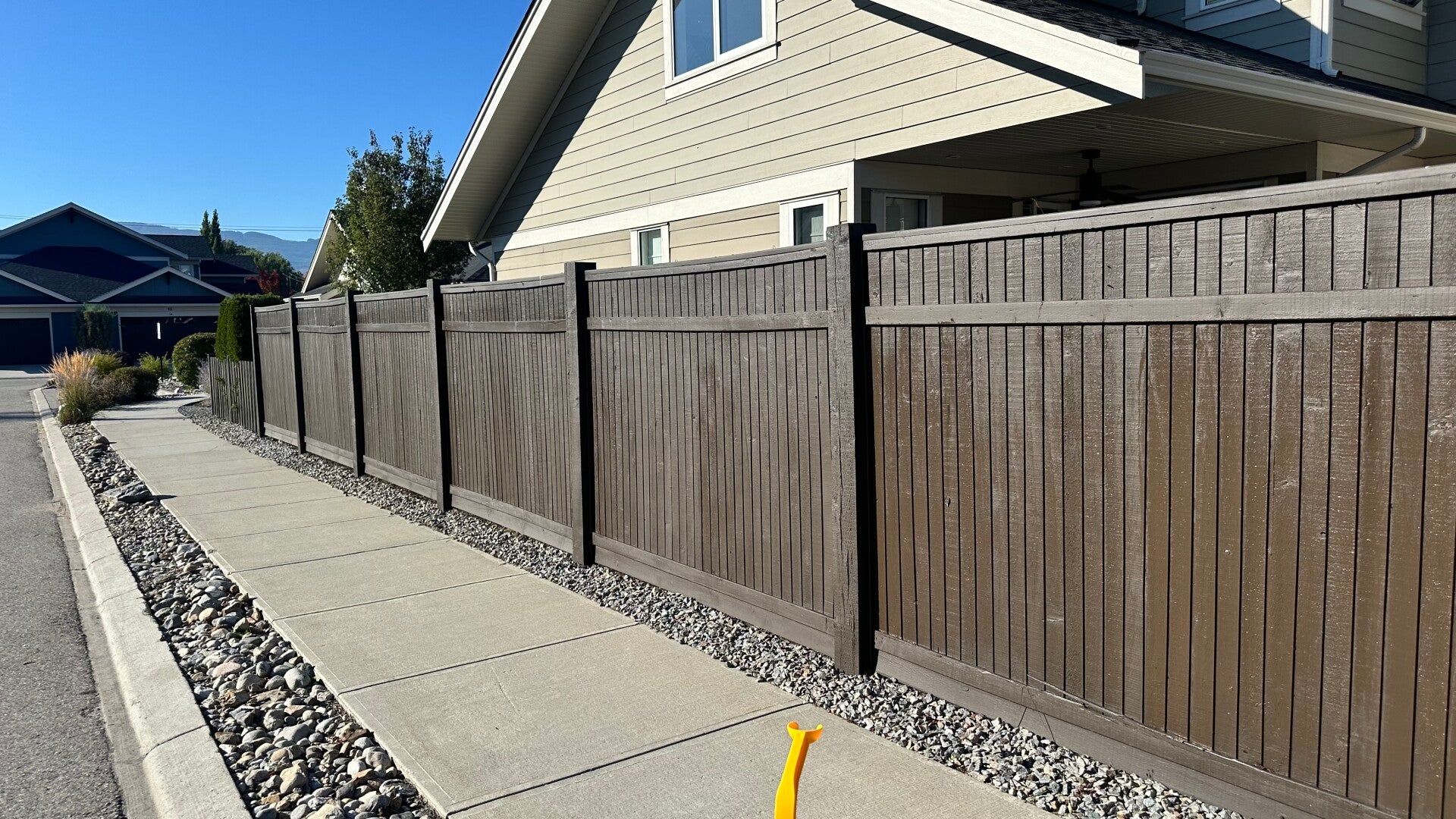 Evenly finished wooden privacy fence