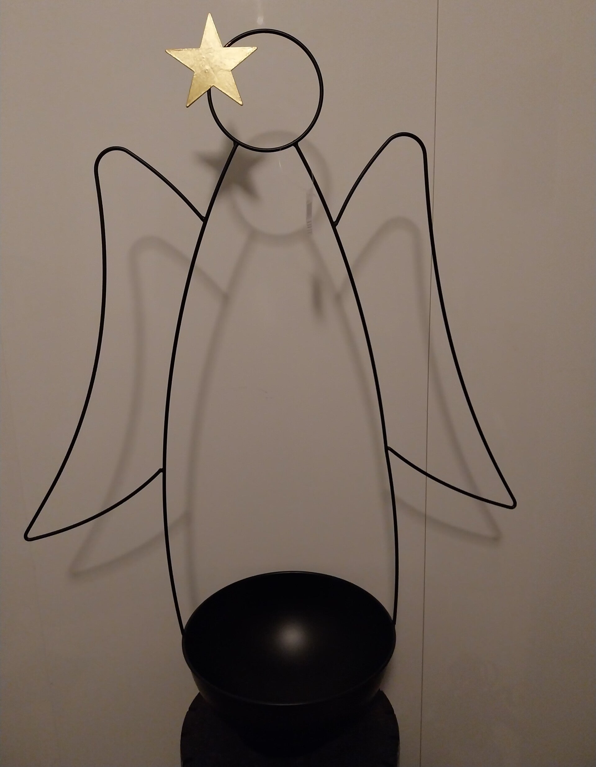 Metalen engel met houder