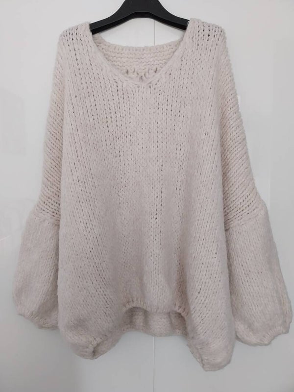 Beige gebreide trui