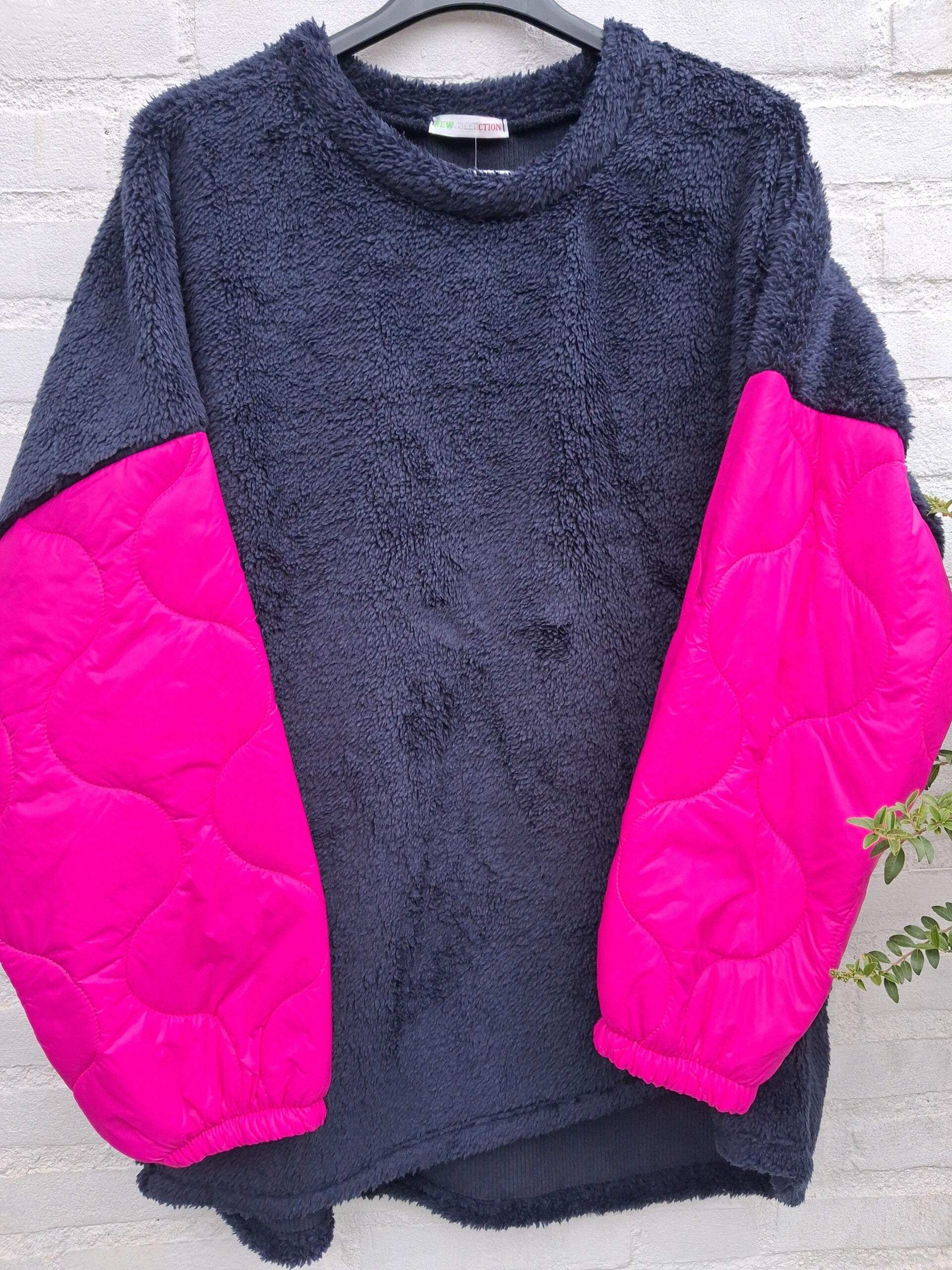 Teddy vest roze mouwen