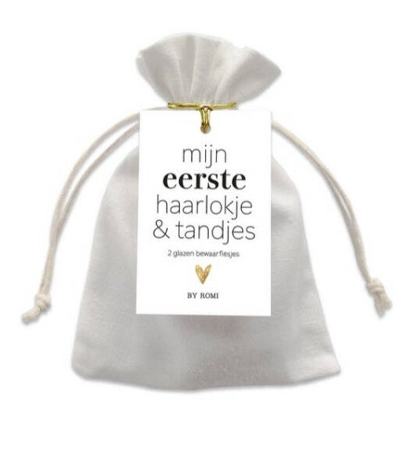 Mijn eerste haarlokjes en tandjes