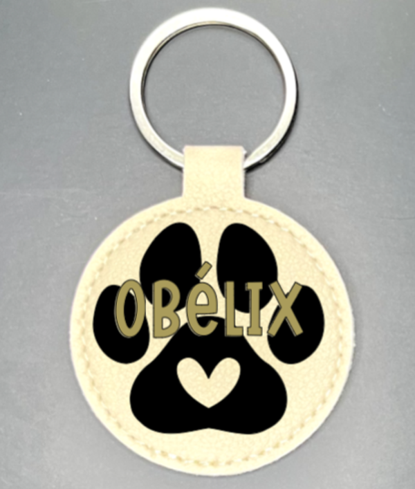Porte clés rond patte chien