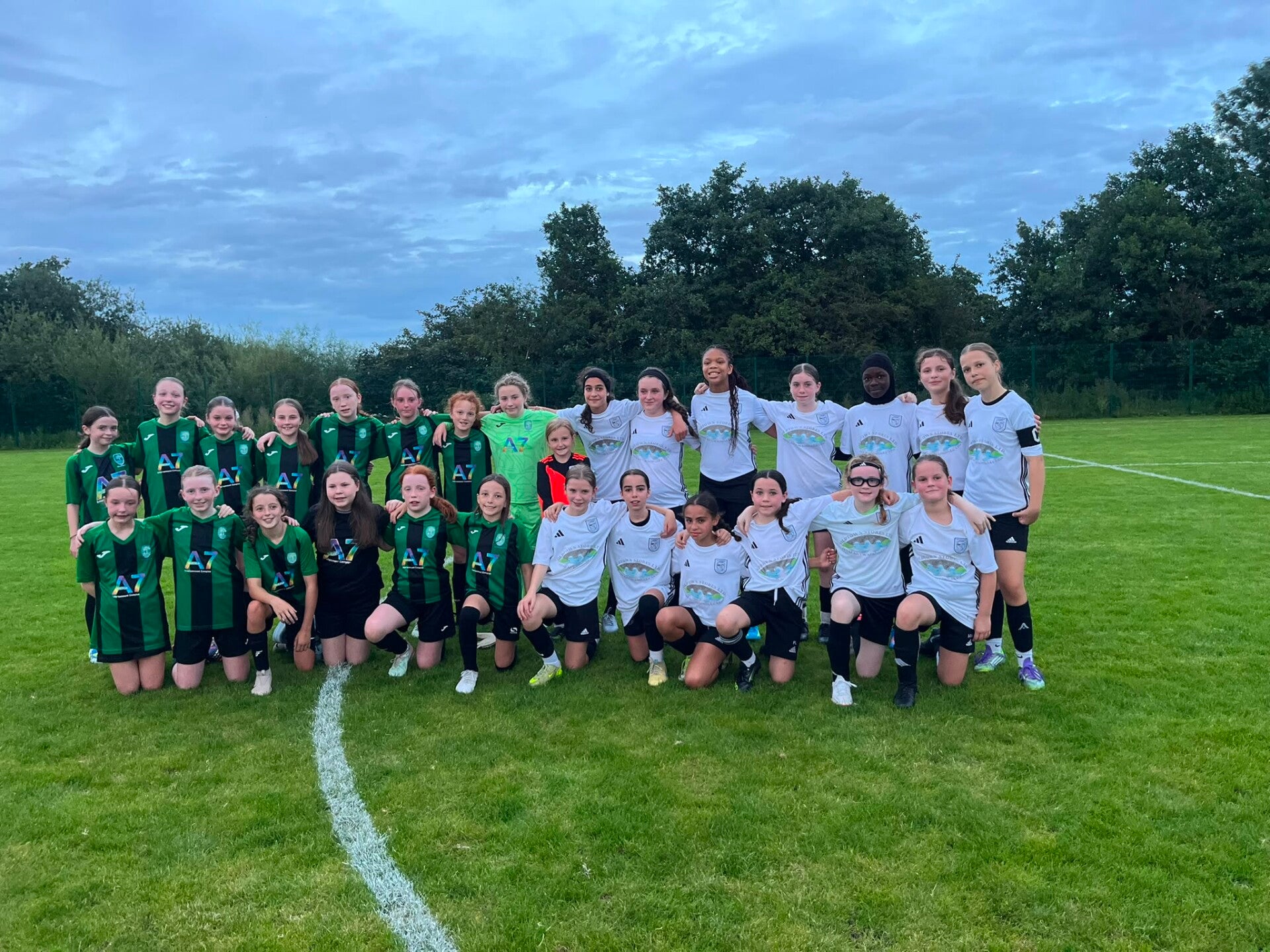 U12 Girls along with Ballyraine girls after thier match.