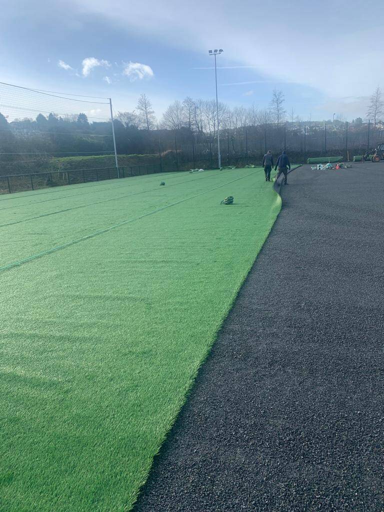 the grass carpet is being put down for the new astro facility at Letterkenny Rovers FC