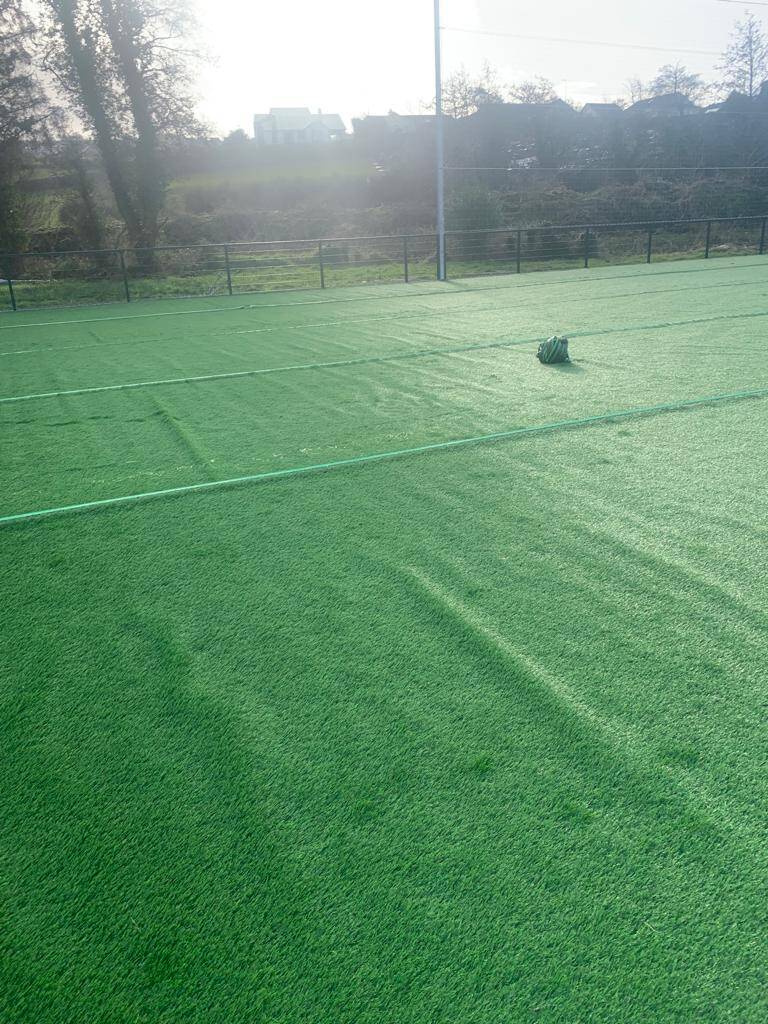 another image of the grass carpet is being put down for the new astro facility at Letterkenny Rovers FC