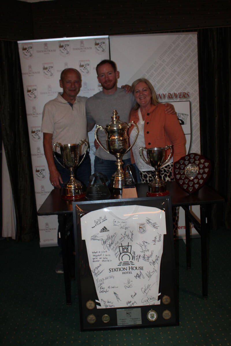 Chris Malseed along with his proud parents after receiving his Outstanding Service Award