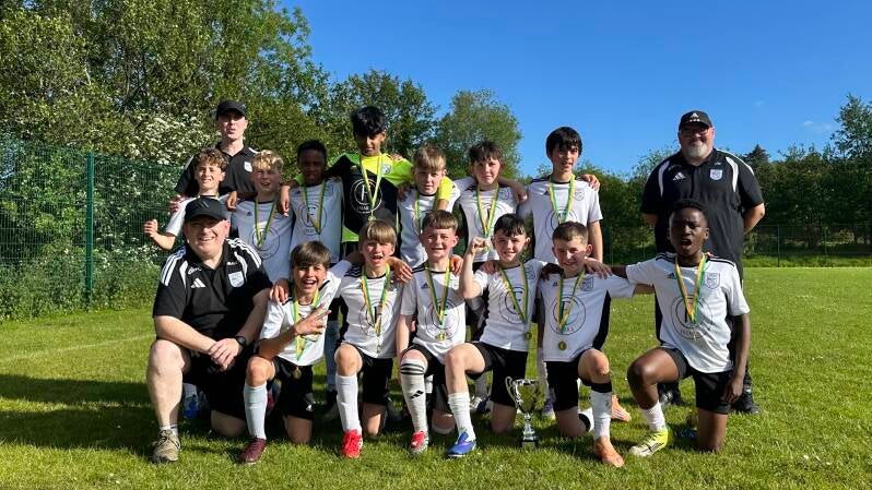U12 Crusaders team photo after winning the First Division League Cup on 24th May 2026
