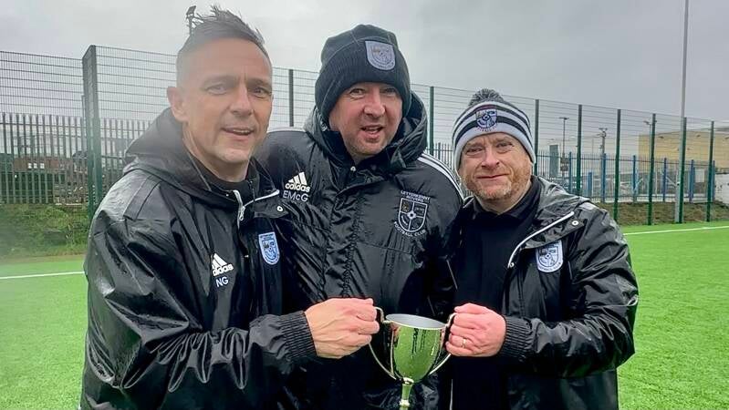 Nicky Gormley, Eddie McGath, and Gerry McGroarty celebrate the League win as the team claimed the Finn Travel Division 3 title on 16th March 2024
