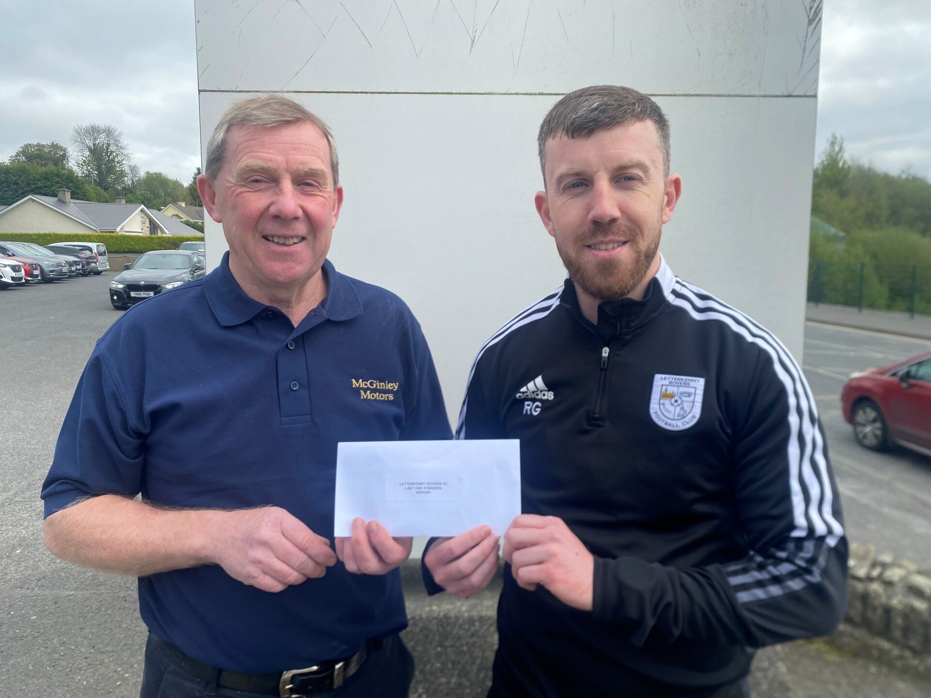 Last One Standing winner was Michelle McGinley. The picture is of her dad Gerard receiving the prize on her behalf from first team player Rory Gallagher