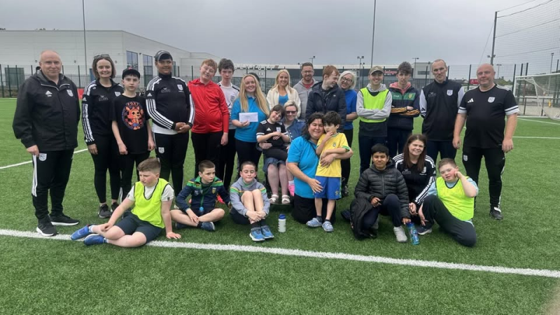 Letterkenny Rovers Football for All group present Letterkenny Autism Support Group with a donation raised at a fundraising coffee morning,