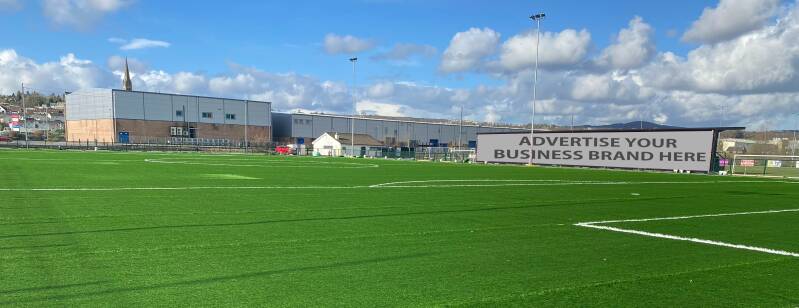image of the new astro with the grass carpet all laid. Signage available for advertising. Click on the image to go to fundraising page for more details.