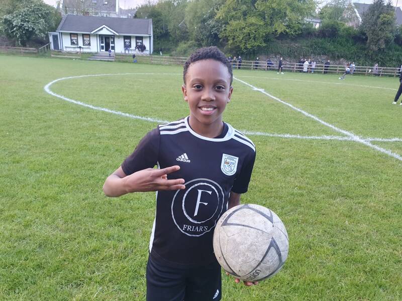 U12 Letterkenny Crusaders player Brandon Ndlovu with match ball after scoring hat-trick on 14th May 2026