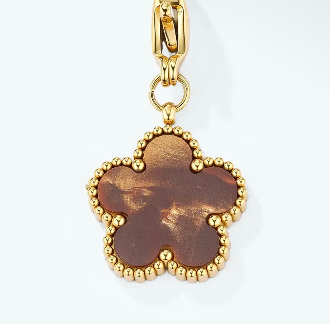 Charm fleur marron