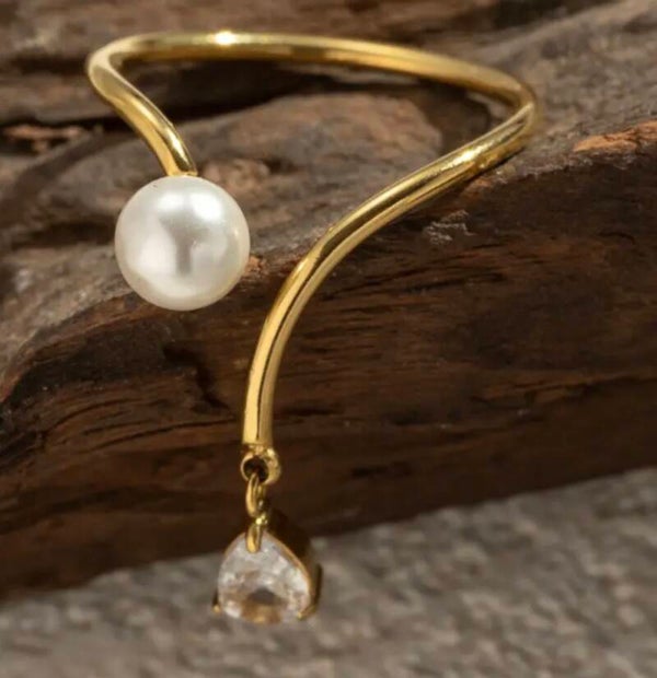 Bague raffinée perle cristal pendante
