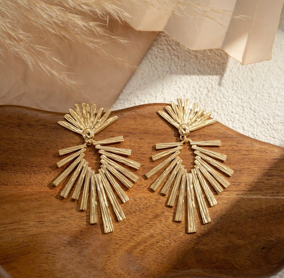 Boucles d'oreilles doré rayon texturé