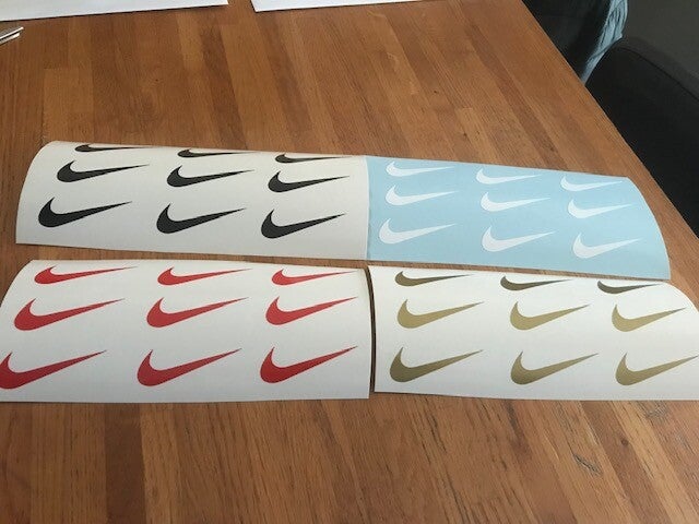 NIKE- 9 STICKERS AUTOCOLLANTS VINYLE- 6.3 CM PAR 2.3 CM