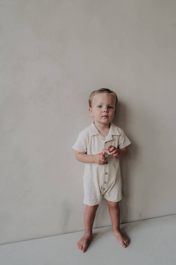 Summer onesie jacquard beige met kraag