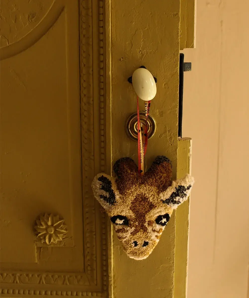 Doing Goods hanger giraffe