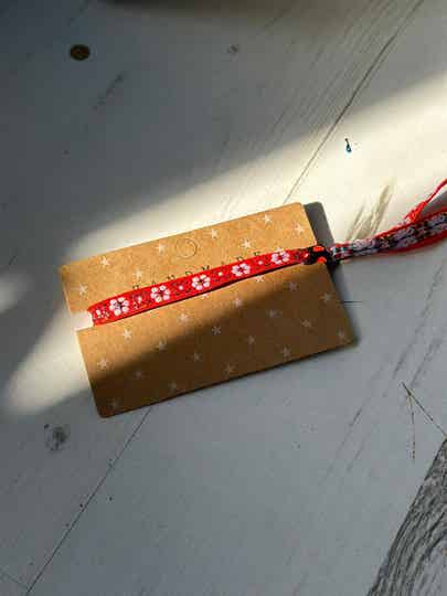 oranje lint armband bloemen