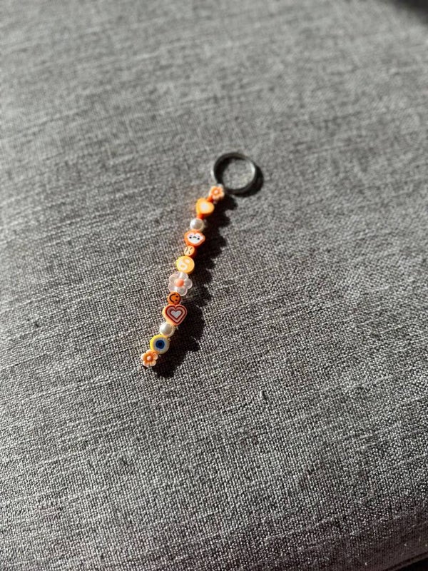 klein oranje sleutelhanger