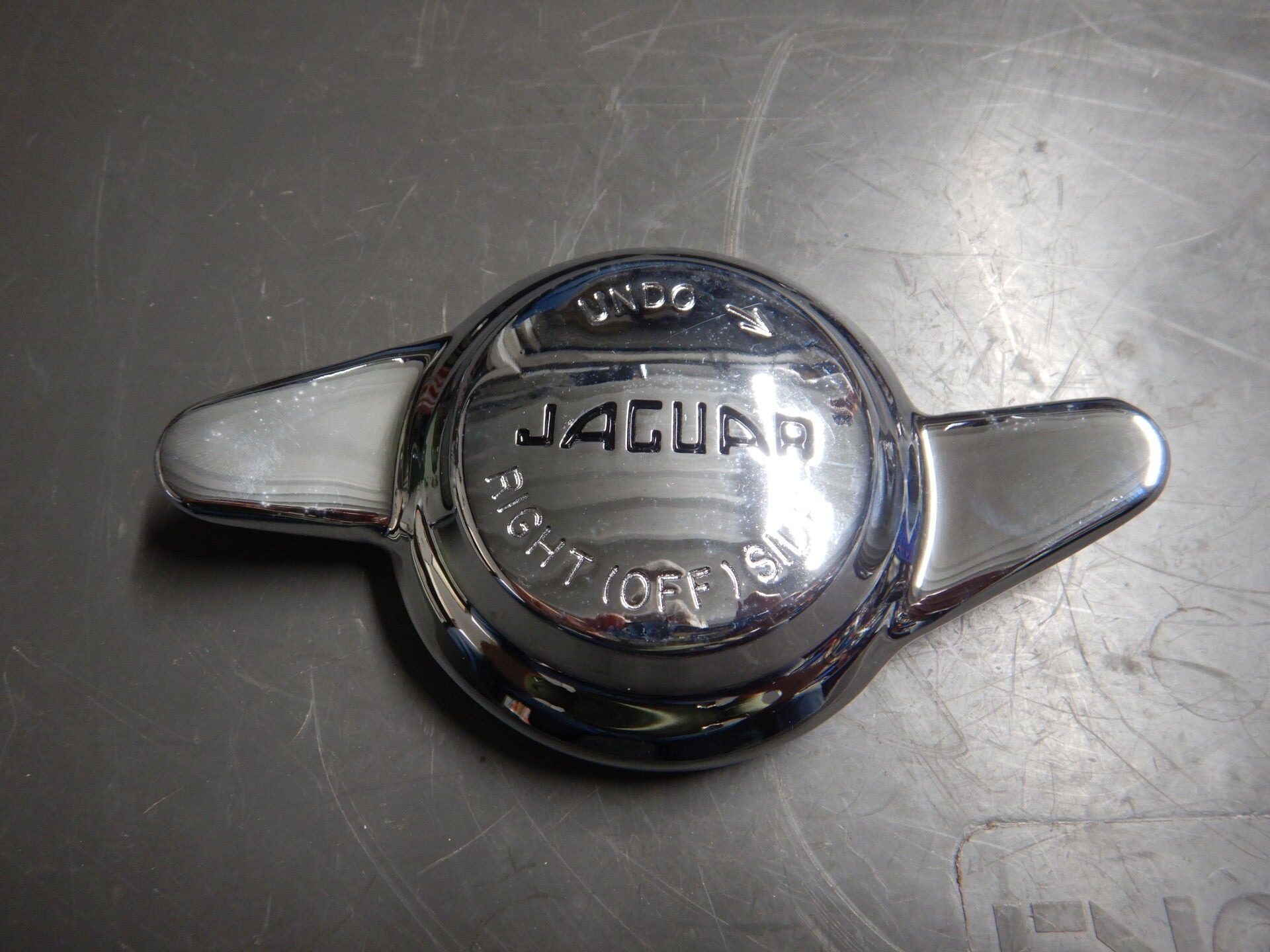 Two Eared Chroome Wheel Spinner RH  C1102X