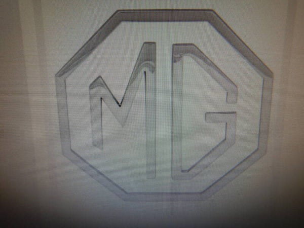 Badge, MG, 3 piece, metal    AHH5261C