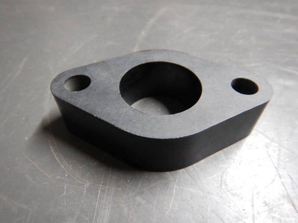 Spacer, carburettor to manifold  AHH5713