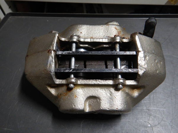 Brake Caliper Solid Disc   type 4 pot  LH incl brakepads  BAU5126