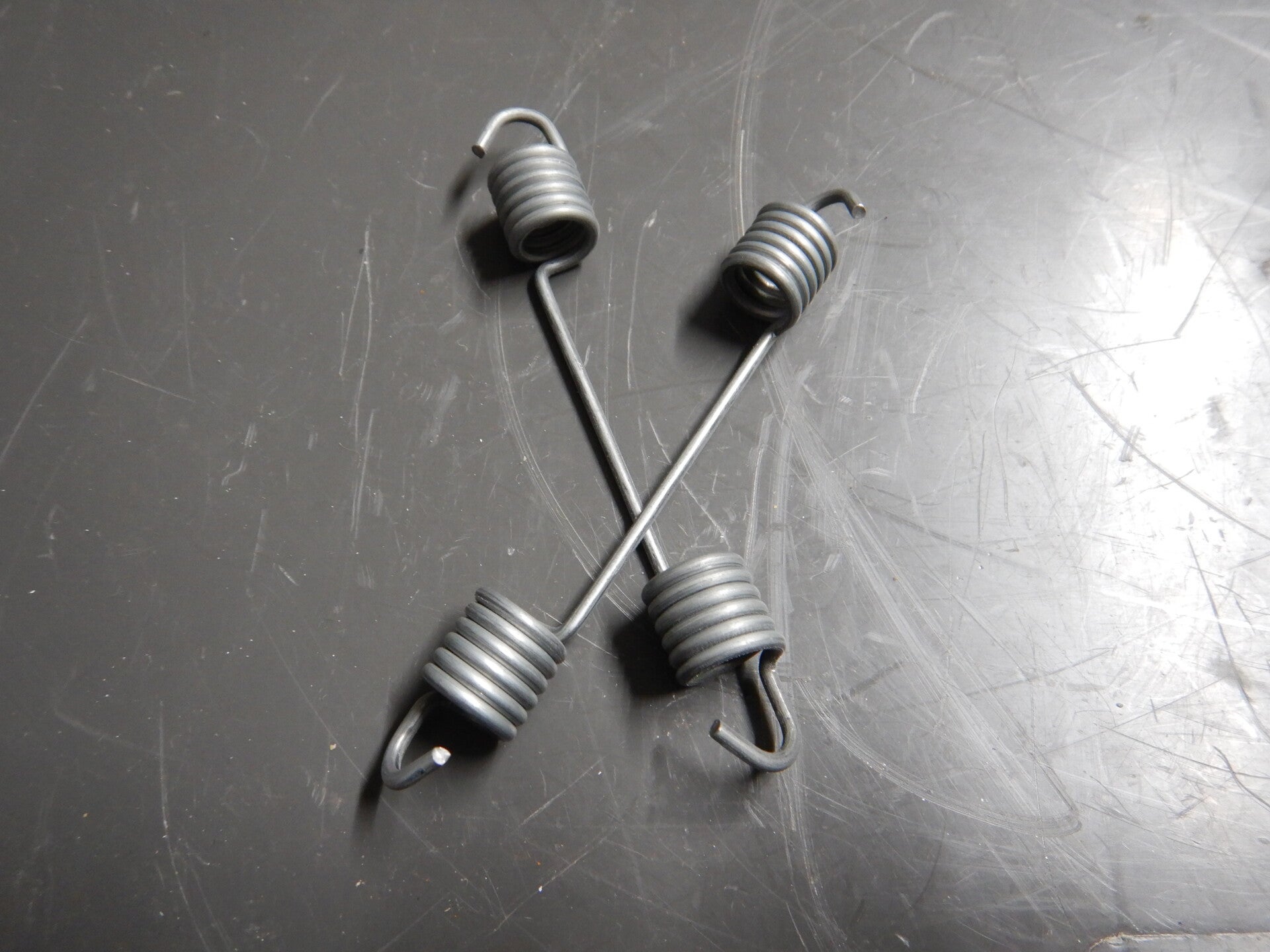 Spring, handbrake pull off   27H6479