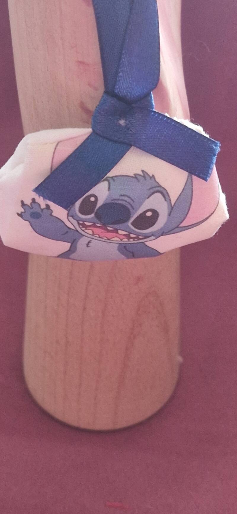 Boule de Noël en tissu motif stich bras croisés