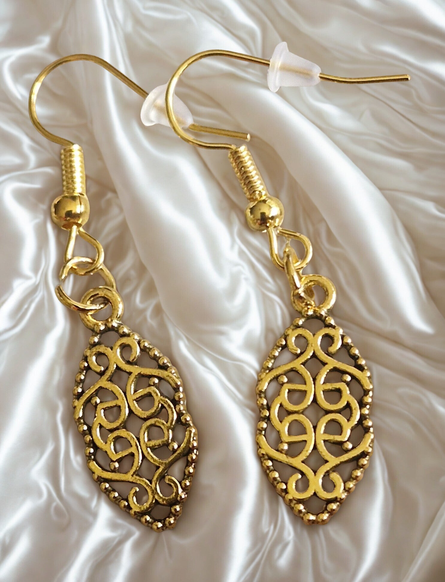 Boucles d'oreilles acier motif feuilles modèle 2 doré