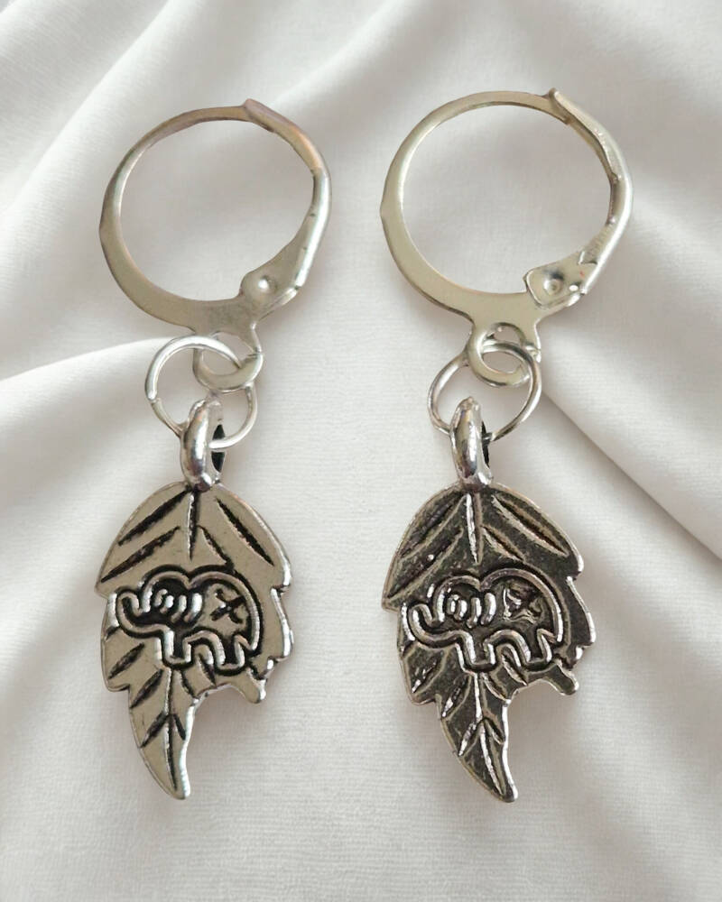 Boucles d'oreilles acier motif    