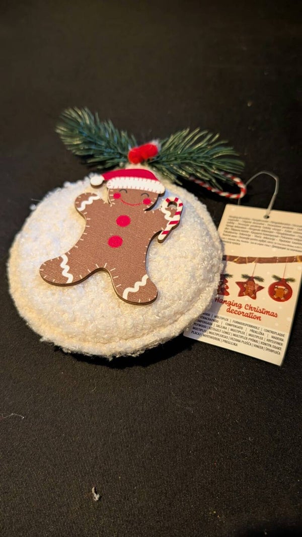 Kerstornament in de vorm van peperkoekmannetje