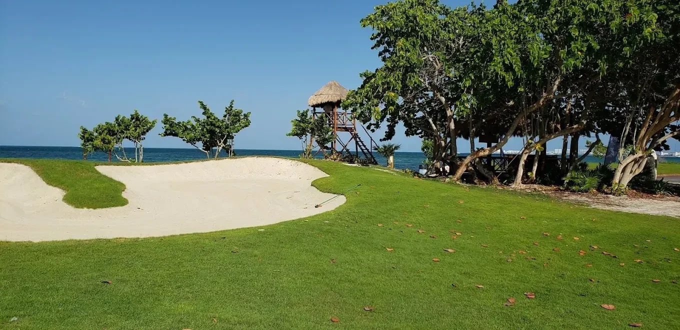 Golf course surrounded by mangroves and natural canals
