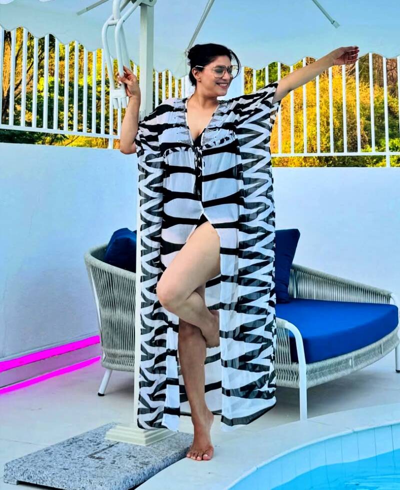 Neha Swami in swimsuit